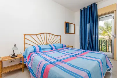 Image de Appartement 'I Ciottoli Dello Ionio - Apt 10' avec vue sur la mer, terrasse commune et balcon