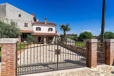 Image de Maison de vacances avec climatisation et terrasse