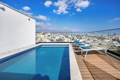 Image de 202 Piliou Grand balcon et piscine commune sur le toit