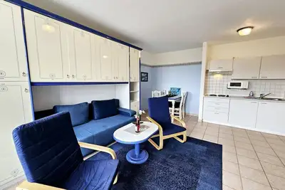 Image de Stylish 2-room apartment with balcony and water view.