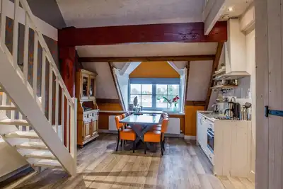 Image de “Enjoy ultimate relaxation in this apartment with private wellness center, steam cabin and whirlpool. Discover the comfort of an authentic farmhouse, with delicious fresh bread every day, near the beach of Callantsoog.