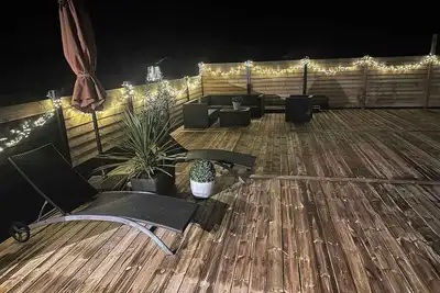 Image de Stylish beachside cottage with large terrace