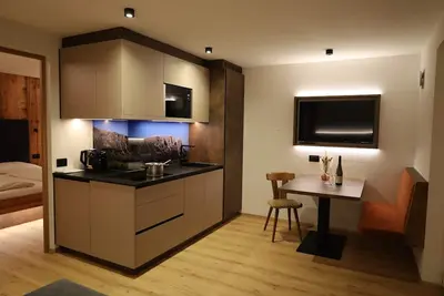 Image de Appartement « Schlern » avec vue sur la montagne, terrasse privée et Wi-Fi