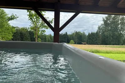 Image de Chalet dans un écrin de verdure avec spa privatif