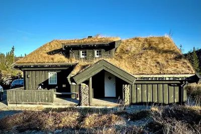 Image de Cabin in magnificent landscape and hot tub inside