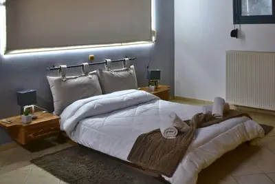 Image de Βίλα δίπλα στη θάλασσα και στο βουνό, ιδανική για οικογένειες