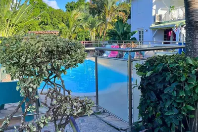 Image de À seulement 3 min à pieds de la plage! Logement cosy