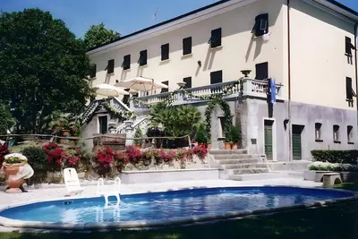 Image de Appartement 'Villa Pini - Franca' avec piscine partagée, Wi-Fi et climatisation