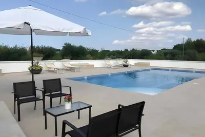 Image de Appartement 'Villa Bianca N F' avec piscine privée, terrasses et Wi-Fi
