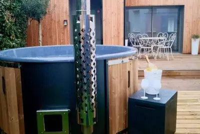 Image de Cottage du Fort avec jaccuzy bain nordique  à 10min à pieds de la plage