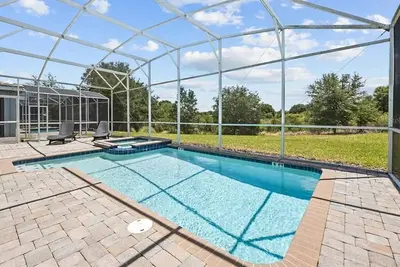Image de 6 bed/6ba Free Pool Heat & Grill, South Facing Pool, ChampionsGate, Near Disney