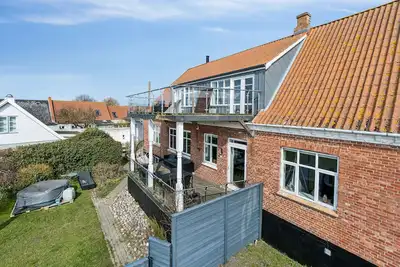 Image de Close to the sea bright apartment in Arnager