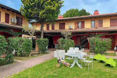 Image de Maison confortable avec jardin partagé