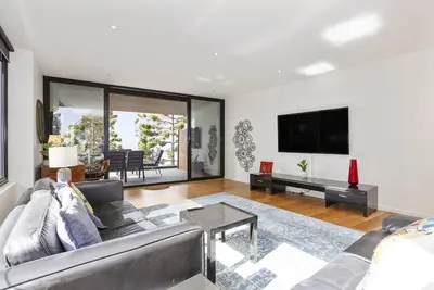 Image de Appartement en bord de mer avec vue imprenable sur la baie