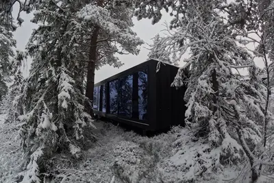 Image de Cabine moderne et unique conçue par Snøhetta, située à Blefjell