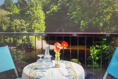 Image de Riverside Cottage views from veranda to the river and wildlife it brings