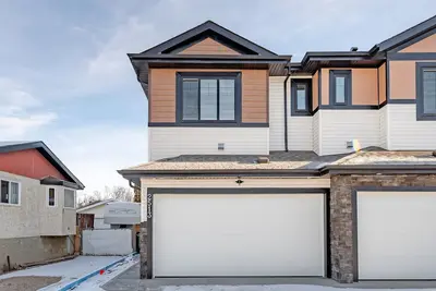 Image de Modern Duplex with Ac Nearby Grey Nuns & Sleeps 8