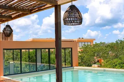 Image de Stylish Jungle Condo with Pool in Tulum – Ac & Gym