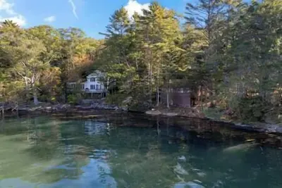 Image de 1920s Riverfront Cottage – Historic Maine Charm