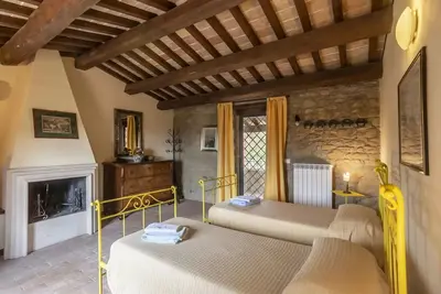 Image de Chambre avec climatisation, Wifi, piscine privée, Tv, patio, vue panoramique, près de Pérouse
