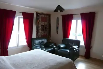 Image de Chambre d’hôtes « Chambre Africaine » avec terrasse partagée, jardin partagé et Wi-Fi