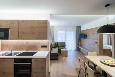 Image de Appartement 'Trilocale C1 env. 65 m²' avec vue jardin, balcon et Wi-Fi
