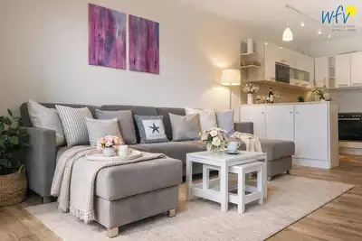 Image de House Dünenblick: Fantastic vacation apartment with balcony, terrace, garden