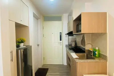 Image de Accessible Cozy Condo Near Mactan Airport | Work remotely | Fast WiFi | Spacious