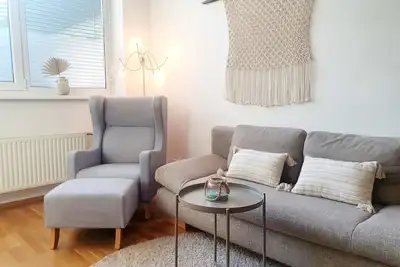 Image de Innenstadt Ferienwohnung mit Parkplatz & Veranda. Haustierfreundlich!