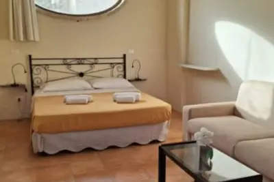 Image de Chambre « Residenze Uliveto - Residenza 8 » avec piscine partagée, terrasse privée et climatisation