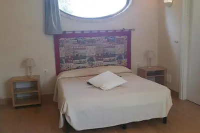 Image de Appartement « Residenze Uliveto - Residenza 10 » avec piscine partagée, terrasse privée et climatisation