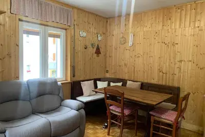 Image de Appartement 'Rustichello' avec vue sur la montagne et balcon