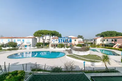 Image de Villaggio dei Gabbiani < Pool and Parking Place >