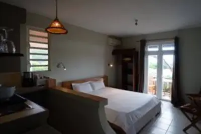 Image de Maison d'hôtes avec vue sur l'océan à Tamarin, piscine, coucher de soleil