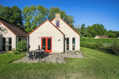 Image de Bungalow lac avec jardin à Ewijk
