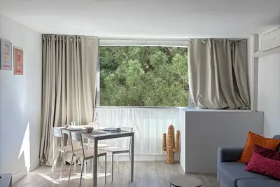 Image de Soleil couchant - Studio lumineux avec piscine à 10 min à pied de la plage