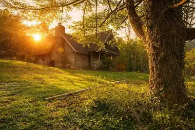 Image de Townsend Charm: River View Historic Log Cabin!