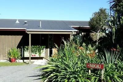 Image de Charming Cottage Accommodation with Panoramic Sea View on West Coast, New Zealand