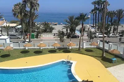 Image de Appartement 'Playa Velilla Park Ii' avec piscine commune, Wi-Fi et climatisation