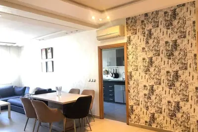 Image de Spacious Apt with High-Speed WiFi & Parking - Center