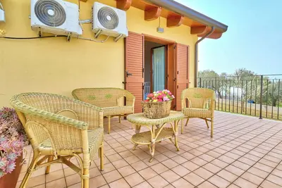 Image de Joli appartement dans une maison de vacances pour 4 personnes avec Wifi, climatisation et terrasse