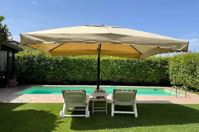 Image de Maison de Vacances « Il Giardino Di Magò » avec Piscine Privée, Jardin Privé et Wi-Fi