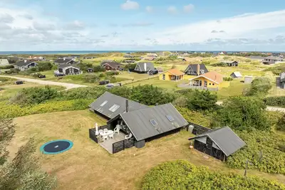 Image de Lovely holiday home with wood-burning stove, close to the North Sea in.