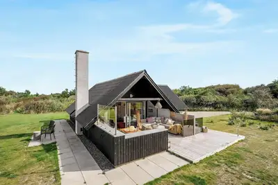 Image de Charming holiday home with large terrace and views over the golf course towards.