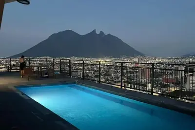 Image de Elegante Suite con vistas | Alberca, co work y gym