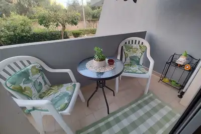 Bright apartment with veranda and private parking space.