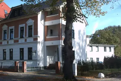 Image de Maison d’hôtes « Appartement près des rives de la Müritz » avec balcon et Wi-Fi
