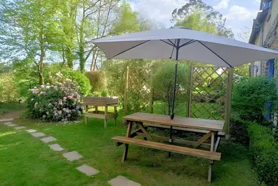 Image de Maison de vacances « Gîte La Longère de Brocéliande » avec jardin privé