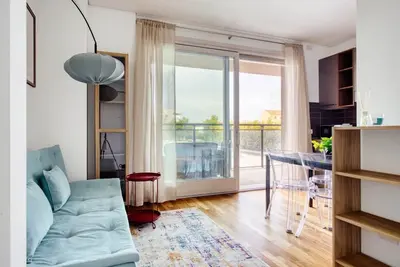 Image de Elegant two-room apartment in Milan located on the 2° floor with elevator for 4 guests, with double bedroom, living room with sofa bed and fully equipped kitchen. Large furnished balcony with city views. The modern palace offers a swimming pool, gym and