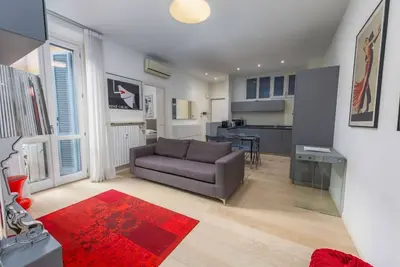 Image de Cozy and modern apartment in Via Antonio Kramer, in the heart of Milan. It has two bedrooms, living room with sofa bed, equipped kitchen, balcony and private bathroom. Equipped with free WiFi, air conditioning, Tv, dishwasher and washing machine. Located